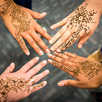 Students with henna tattoos at International Festival