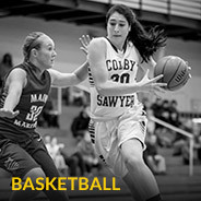 Colby-Sawyer women's basketball player moving down court