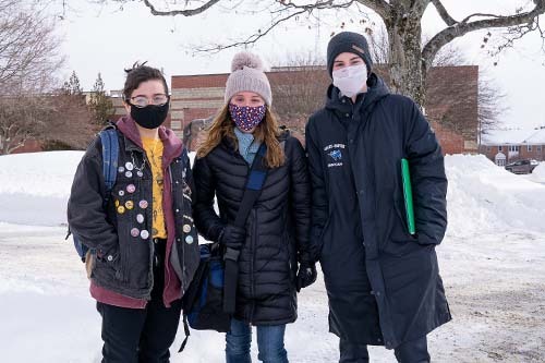 students standing in snow